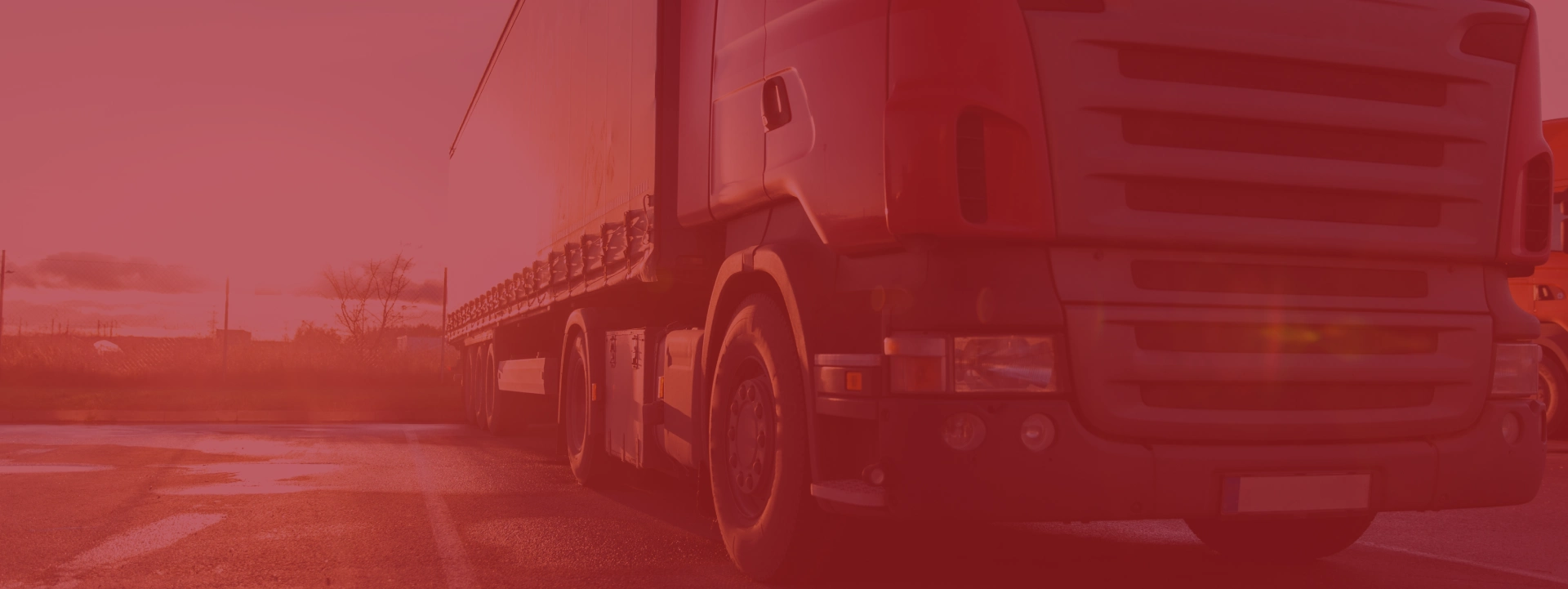 TOP Worldwide expedited freight services with a semi truck speeding down the highway for time-critical deliveries.