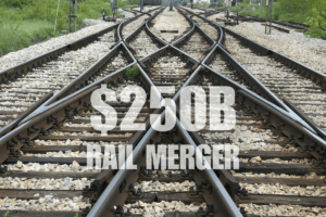 Two major freight railroads merging tracks, symbolizing the $250 billion Union Pacific and Norfolk Southern merger creating the first U.S. transcontinental rail network.