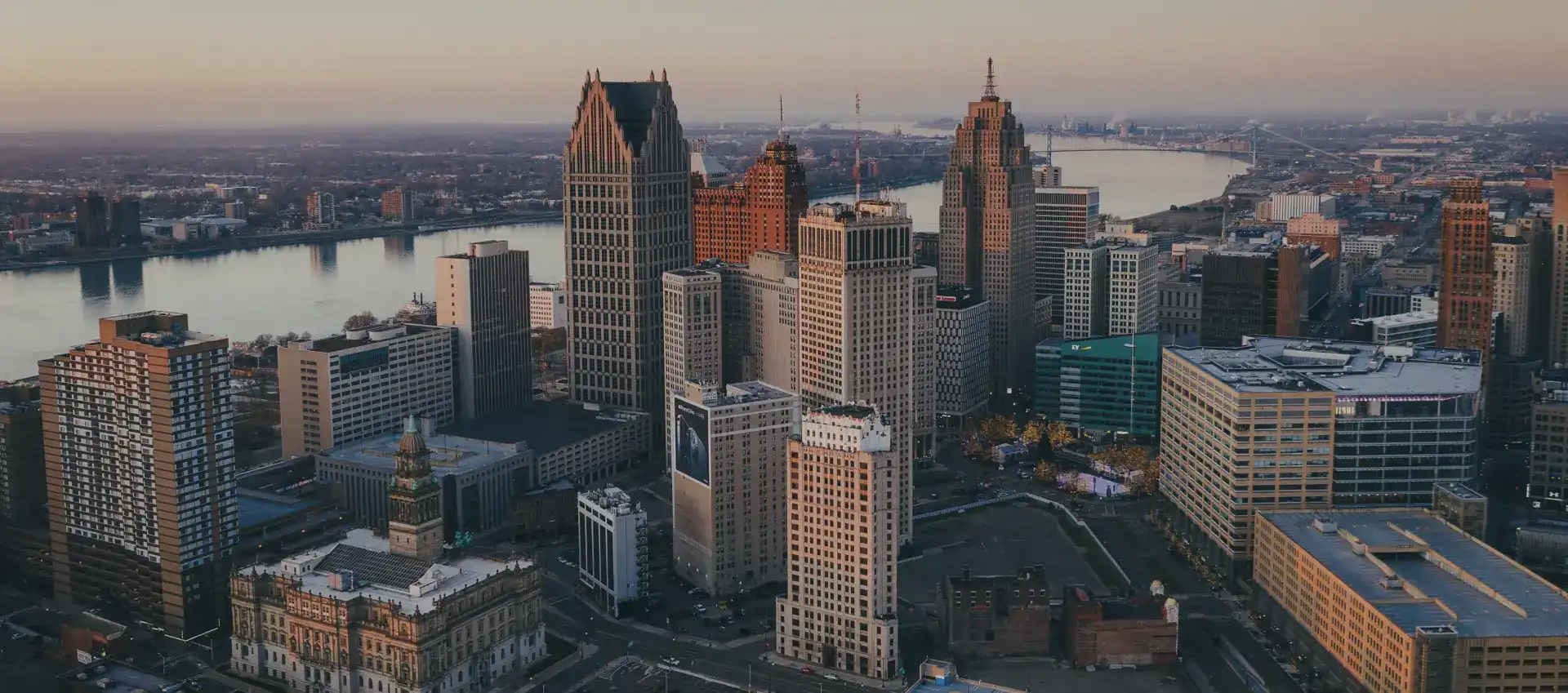 home-hero-detroit-skyline Aerial view of the downtown Detroit skyline, home of TOP Worldwide freight and logistics services