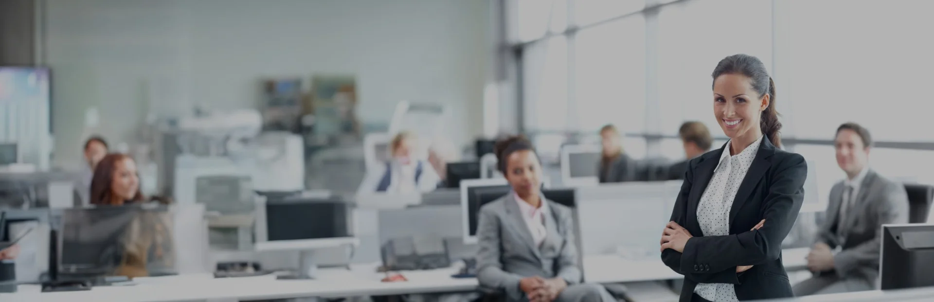 Sales agent standing confidently, representing career opportunities with TOP Worldwide in freight and logistics services.